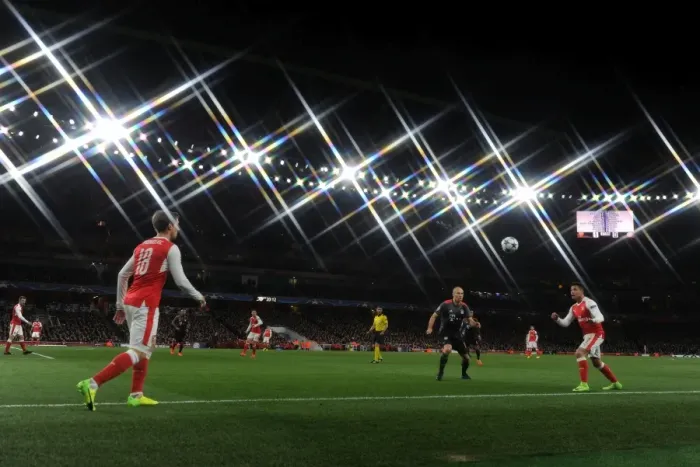 Framed Print : Monreal Throws to Sanchez: Arsenal vs. Bayern Munich in Champions League Showdown (2016-17)