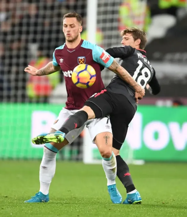 Framed Print : Monreal vs Arnautovic: A Premier League Showdown at London Stadium