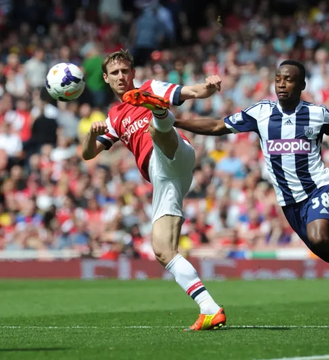 Framed Print : Monreal vs. Berahino: A Tense Face-Off at Emirates Stadium - Arsenal vs. West Bromwich Albion (2013-14) Framed Print : Monreal vs. Berahino: A Tense Face-Off at Emirates Stadium - Arsenal vs. West Bromwich Albion (2013-14)