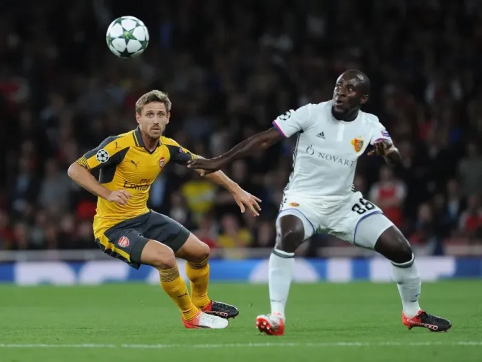 Framed Print : Monreal vs. Doumbia: A Battle in the Arsenal vs. FC Basel Champions League Clash Framed Print : Monreal vs. Doumbia: A Battle in the Arsenal vs. FC Basel Champions League Clash