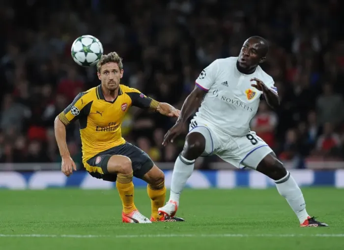 Framed Print : Monreal vs. Doumbia: A Champions League Battle at Emirates Stadium Framed Print : Monreal vs. Doumbia: A Champions League Battle at Emirates Stadium