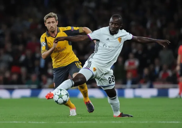 Framed Print : Monreal vs. Doumbia: A Champions League Showdown at Emirates Stadium Framed Print : Monreal vs. Doumbia: A Champions League Showdown at Emirates Stadium