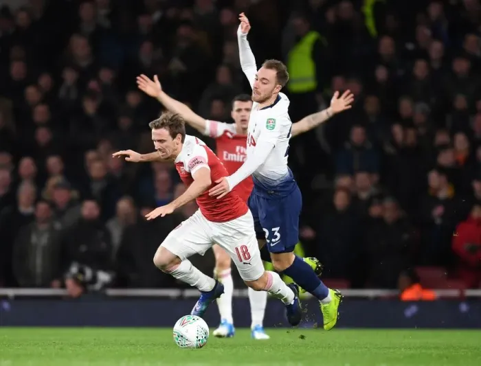 Framed Print : Monreal vs. Eriksen: A Carabao Cup Showdown at the Emirates Framed Print : Monreal vs. Eriksen: A Carabao Cup Showdown at the Emirates