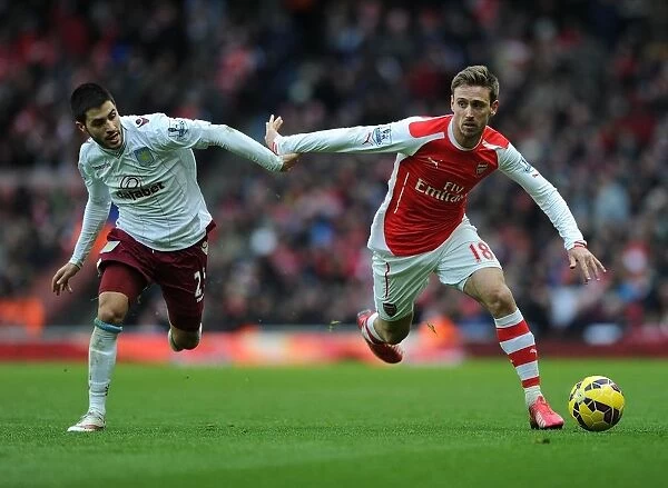 Monreal vs. Gil: Intense Battle at Emirates Stadium - Arsenal v Aston Villa, Premier League 2014-15