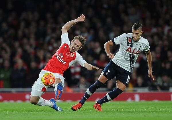 Monreal vs. Lamela: Intense Rivalry Unfolds in the Arsenal vs. Tottenham Clash, Premier League 2015-16