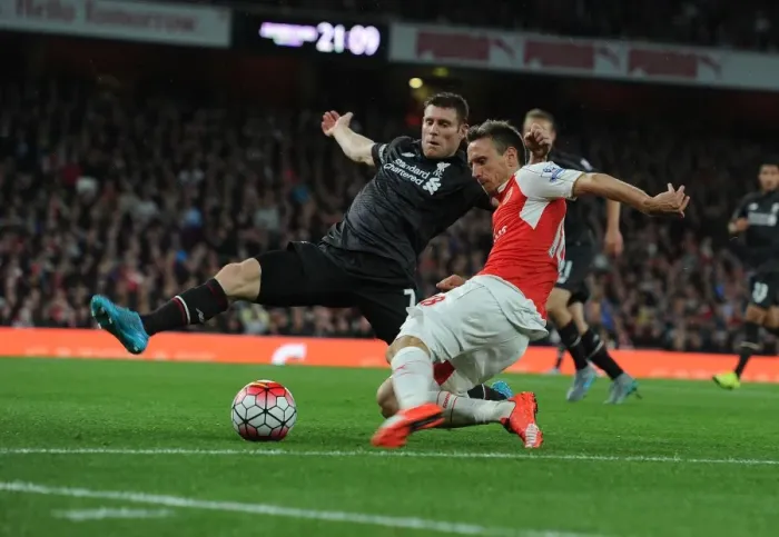 Framed Print : Monreal vs. Milner: Intense Battle in Arsenal vs. Liverpool, Premier League 2015 / 16 Framed Print : Monreal vs. Milner: Intense Battle in Arsenal vs. Liverpool, Premier League 2015 / 16