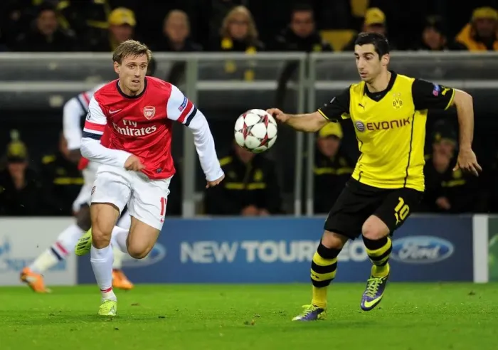 Framed Print : Monreal vs Mkhitaryan: A Champions League Showdown at Borussia Dortmund's Signal Iduna Park Framed Print : Monreal vs Mkhitaryan: A Champions League Showdown at Borussia Dortmund's Signal Iduna Park