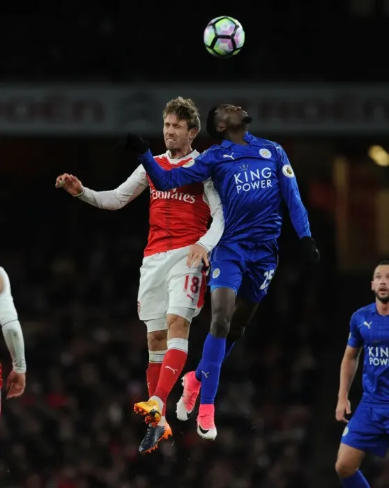 Framed Print : Monreal vs Ndidi: Intense Battle in Arsenal vs Leicester City Premier League Clash
