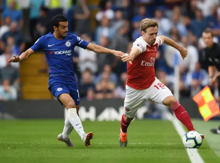 Framed Print : Monreal vs Pedro: A Football Rivalry Ignites at Stamford Bridge Framed Print : Monreal vs Pedro: A Football Rivalry Ignites at Stamford Bridge