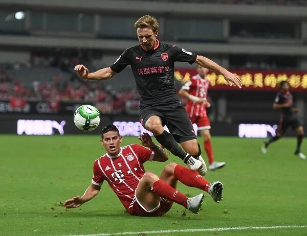 Monreal vs Rodriguez: Battle in Shanghai - Bayern Munich vs Arsenal Pre-Season Clash