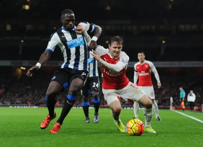 Framed Print : Monreal vs Sissoko: A Premier League Battle at Emirates Stadium (2015-16)