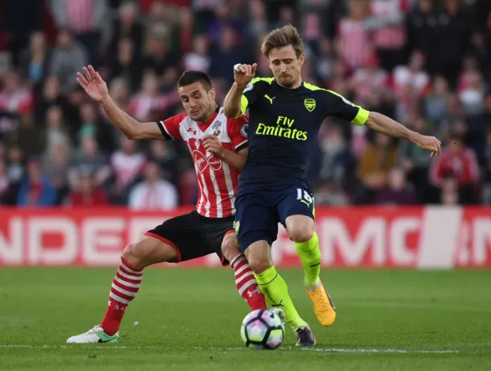Framed Print : Monreal vs. Tadic: Intense Battle in Southampton v Arsenal Premier League Clash Framed Print : Monreal vs. Tadic: Intense Battle in Southampton v Arsenal Premier League Clash
