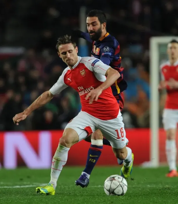 Framed Print : Monreal vs. Turan: A Football Showdown - Arsenal vs. Barcelona, UEFA Champions League 2016