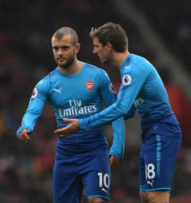 Framed Print : Monreal and Wilshere: Focused on the Ball in Southampton v Arsenal Premier League Clash