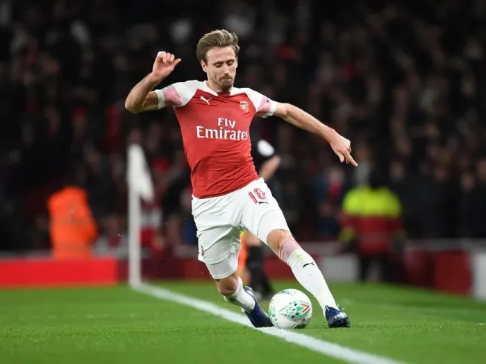 Framed Print : Monreal's Focus: Arsenal vs. Tottenham Carabao Cup Showdown