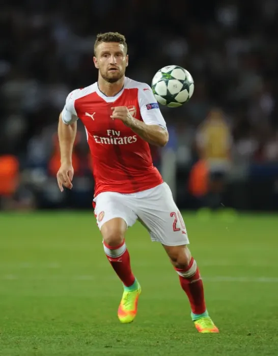 Framed Print : Mustafi in Action: Arsenal vs. Paris Saint-Germain, UEFA Champions League 2016-17
