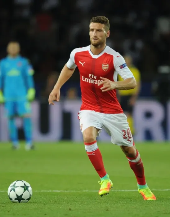 Framed Print : Mustafi in Action: Arsenal vs. Paris Saint-Germain, UEFA Champions League 2016-17