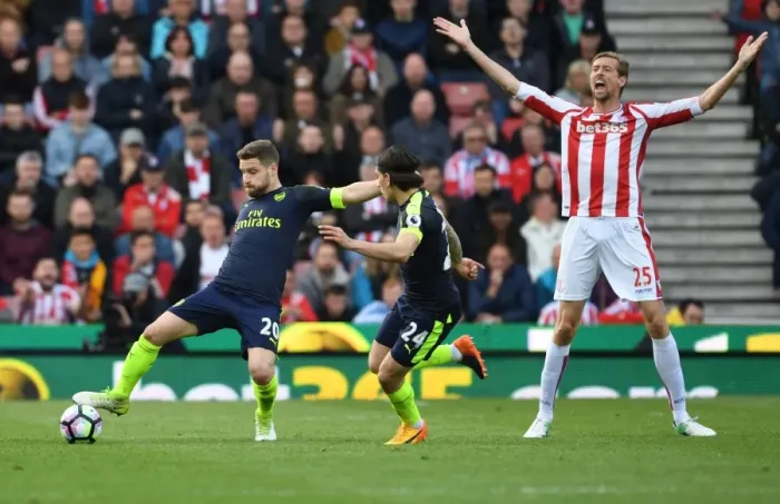 Framed Print : Mustafi and Bellerin Fend Off Crouch: Intense Moment from Stoke vs Arsenal, Premier League 2016-17 Framed Print : Mustafi and Bellerin Fend Off Crouch: Intense Moment from Stoke vs Arsenal, Premier League 2016-17