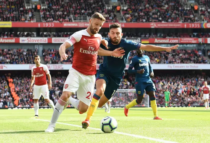 Framed Print : Mustafi Faces Off Against Snodgrass: Arsenal vs. West Ham United, Premier League 2018-19