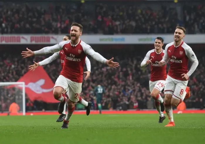 Framed Print : Mustafi and Ramsey's Unforgettable Goal Celebration: Arsenal's Victory Moment vs. Tottenham (2017-18)