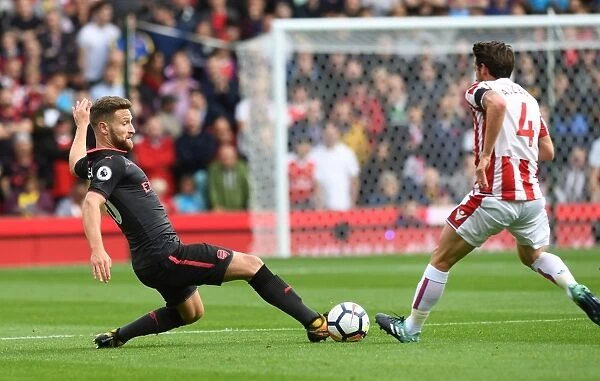 Mustafi Tackles Allen: Intense Moment from Stoke City vs Arsenal (2017-18)