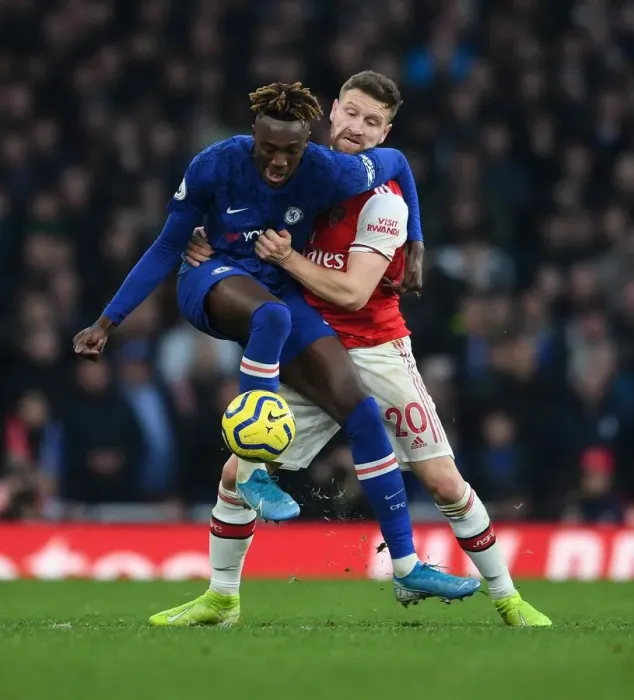 Framed Print : Mustafi vs. Abraham: A Premier League Showdown - Arsenal vs. Chelsea (December 2019), Emirates Stadium