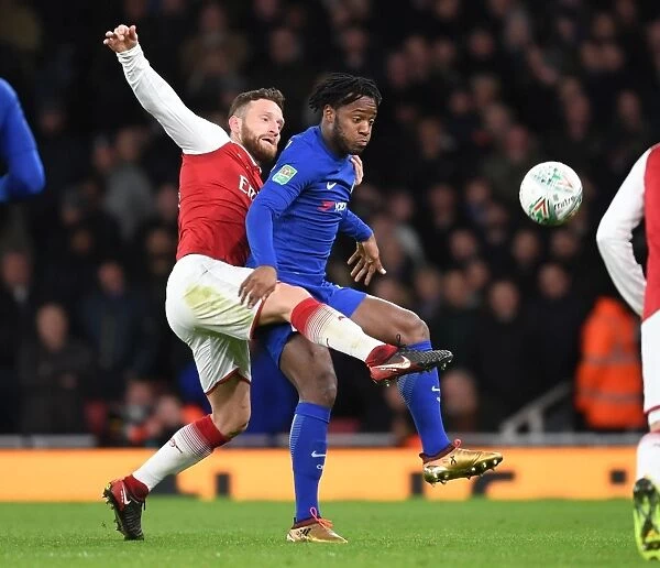 Mustafi vs Batshuayi: Intense Clash in Arsenal v Chelsea Carabao Cup Semi-Final
