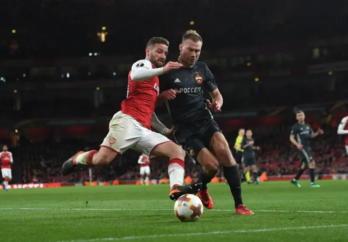 Framed Print : Mustafi vs Berezutski: Battle for Air Supremacy in Arsenal's Europa League Clash with CSKA Moscow