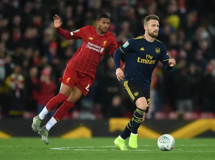 Framed Print : Mustafi vs Brewster: Liverpool vs Arsenal in Carabao Cup Showdown