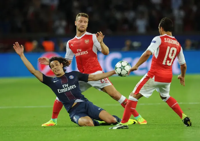 Framed Print : Mustafi vs Cavani: A Champions League Showdown - Arsenal vs Paris Saint-Germain, 2016