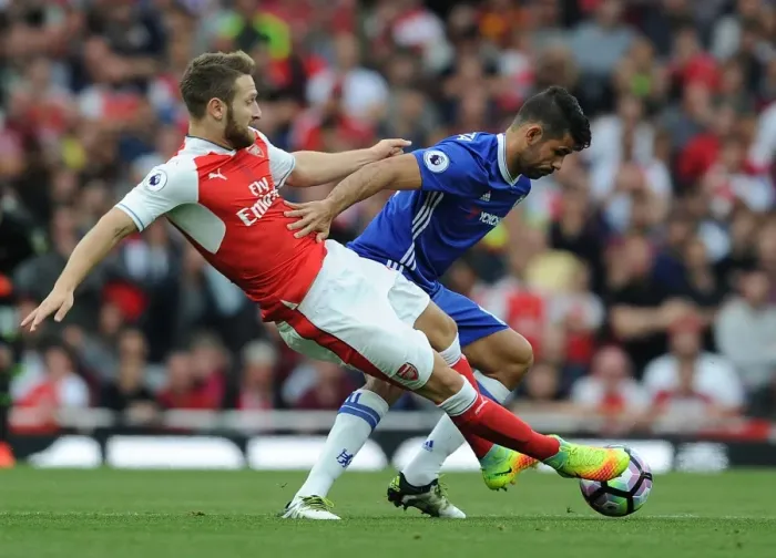 Framed Print : Mustafi vs. Costa: A Premier League Showdown at Arsenal vs. Chelsea
