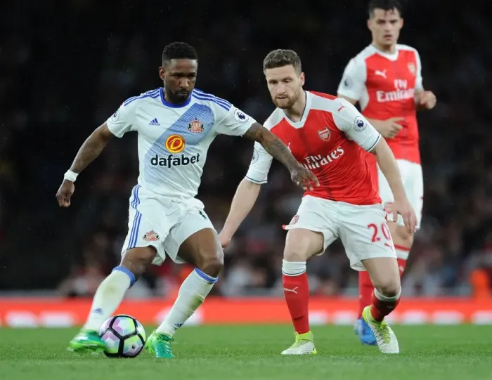 Framed Print : Mustafi vs Defoe: A Riveting Rivalry - Arsenal's Victory Over Sunderland (2016-17) Framed Print : Mustafi vs Defoe: A Riveting Rivalry - Arsenal's Victory Over Sunderland (2016-17)