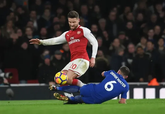 Framed Print : Mustafi vs Drinkwater: Intense Battle in Arsenal v Chelsea Premier League Clash