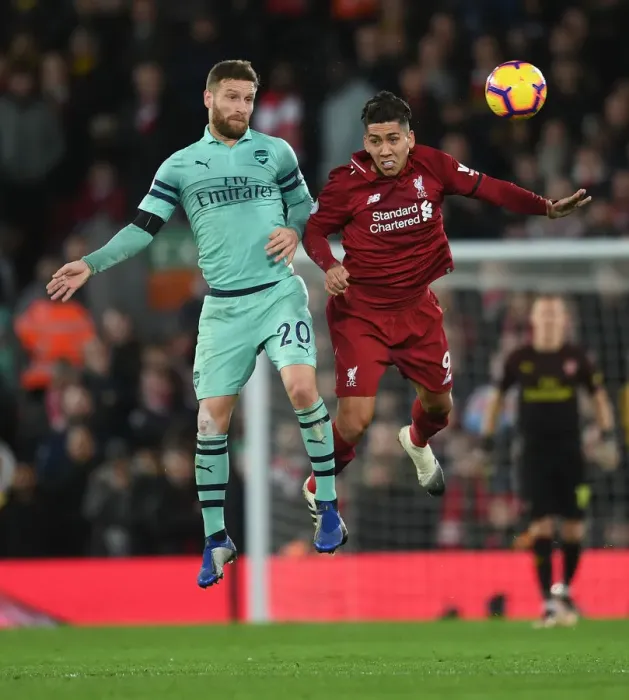 Framed Print : Mustafi vs. Firmino: Heading Clash in the Premier League Battle between Liverpool and Arsenal Framed Print : Mustafi vs. Firmino: Heading Clash in the Premier League Battle between Liverpool and Arsenal