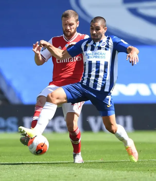 Framed Print : Mustafi vs. Maupay: Empty Stadium Showdown - Brighton vs. Arsenal Premier League Clash