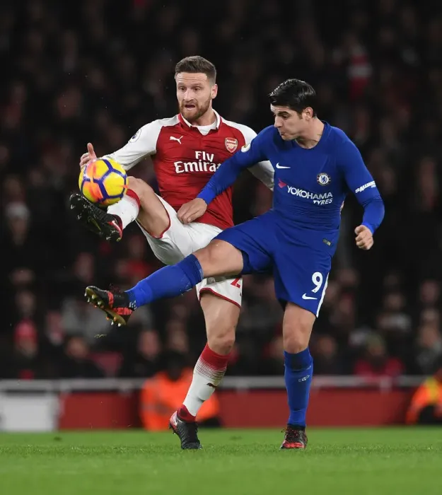 Framed Print : Mustafi vs Morata: A Football Rivalry Unfolds in the Arsenal vs Chelsea Clash