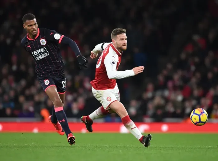 Framed Print : Mustafi vs. Mounie: Intense Battle at Emirates Stadium - Arsenal v Huddersfield Town, Premier League Framed Print : Mustafi vs. Mounie: Intense Battle at Emirates Stadium - Arsenal v Huddersfield Town, Premier League