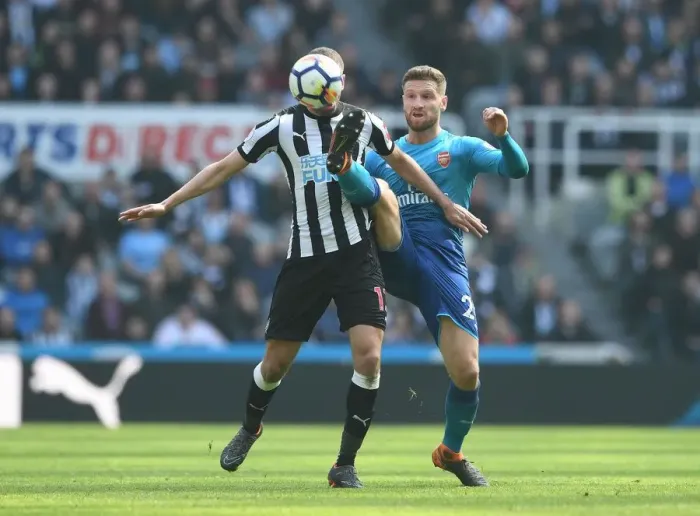 Framed Print : Mustafi vs Slimani: Intense Battle in Newcastle United vs Arsenal Premier League Clash Framed Print : Mustafi vs Slimani: Intense Battle in Newcastle United vs Arsenal Premier League Clash