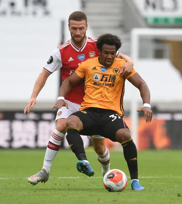 Framed Print : Mustafi vs Traore: Intense Battle at Molineux - Wolverhampton Wanderers vs Arsenal FC, Premier League 2019-2020