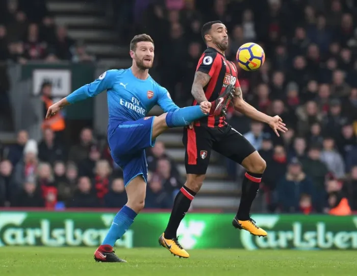 Framed Print : Mustafi vs. Wilson: Intense Clash in AFC Bournemouth vs. Arsenal Premier League Match