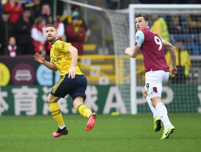 Framed Print : Mustafi vs. Wood: Intense Clash Between Burnley and Arsenal in Premier League