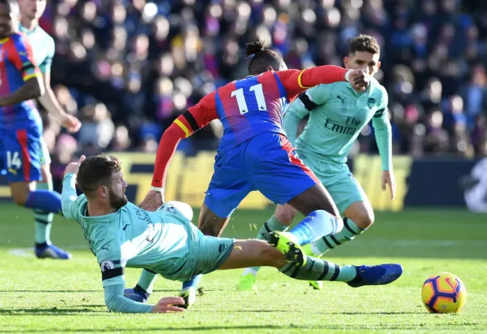 Framed Print : Mustafi vs Zaha: Intense Battle in Crystal Palace vs Arsenal FC Premier League Clash Framed Print : Mustafi vs Zaha: Intense Battle in Crystal Palace vs Arsenal FC Premier League Clash