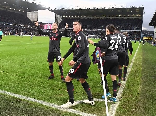 Mustafi and Xhaka Celebrate Arsenal's Goal Against Burnley