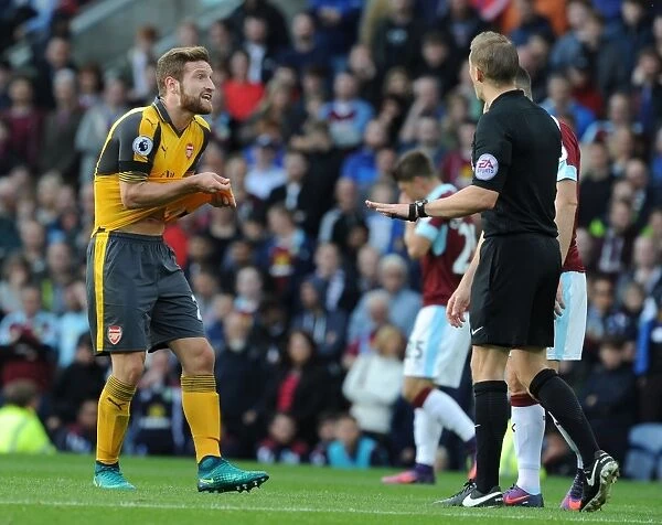 Mustafi's Contentious Encounter with Referee Craig Pawson during Burnley vs Arsenal (2016-17)