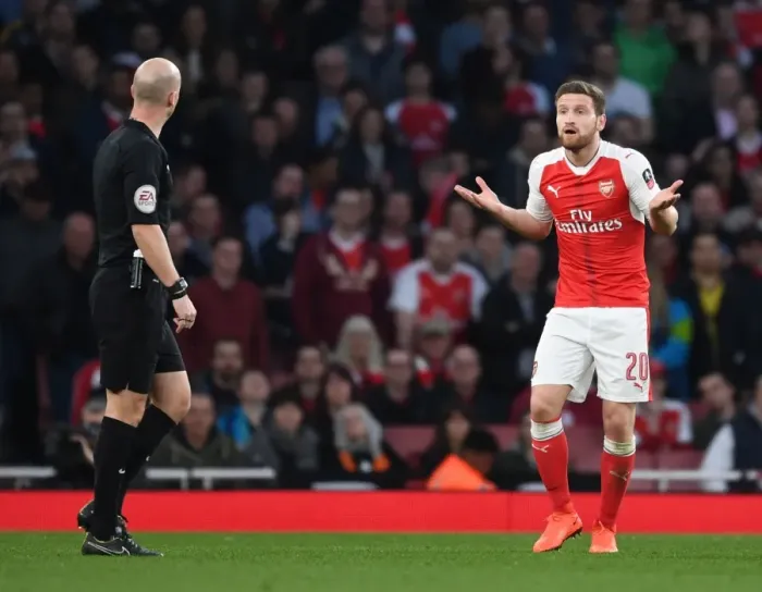 Framed Print : Mustafi's Dispute with Referee Taylor: Arsenal vs. Lincoln City FA Cup Quarter-Final Framed Print : Mustafi's Dispute with Referee Taylor: Arsenal vs. Lincoln City FA Cup Quarter-Final