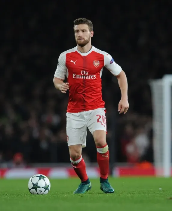 Framed Print : Mustafi's Unforgettable Night: Arsenal Stuns PSG at Emirates (UEFA Champions League 2016-17)