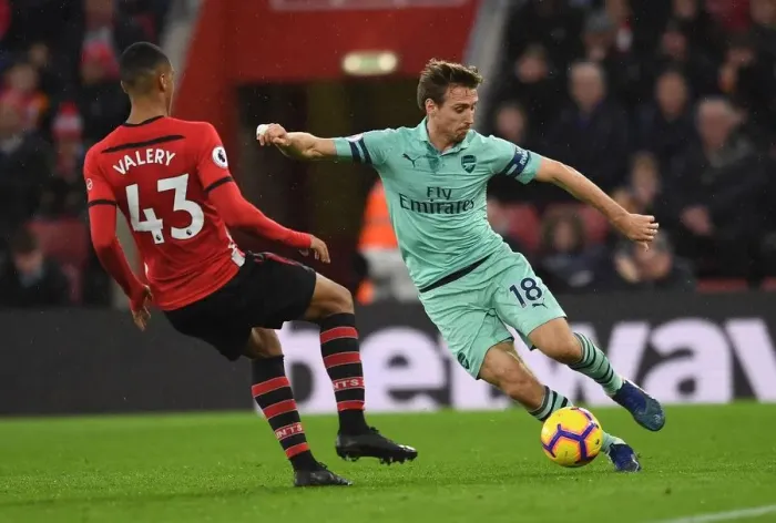 Framed Print : Nacho Monreal (Arsenal) Yan Valery (Southampton). Southampton 3: 2 Arsenal. Premier League