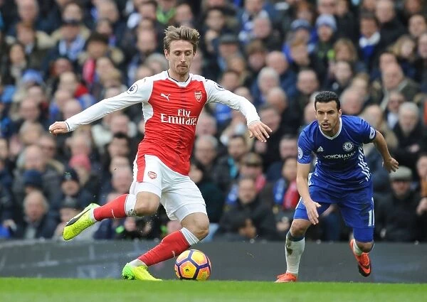 Nacho Monreal Breaks Past Pedro: Intense Moment from Chelsea vs. Arsenal Premier League Clash (2016-17)