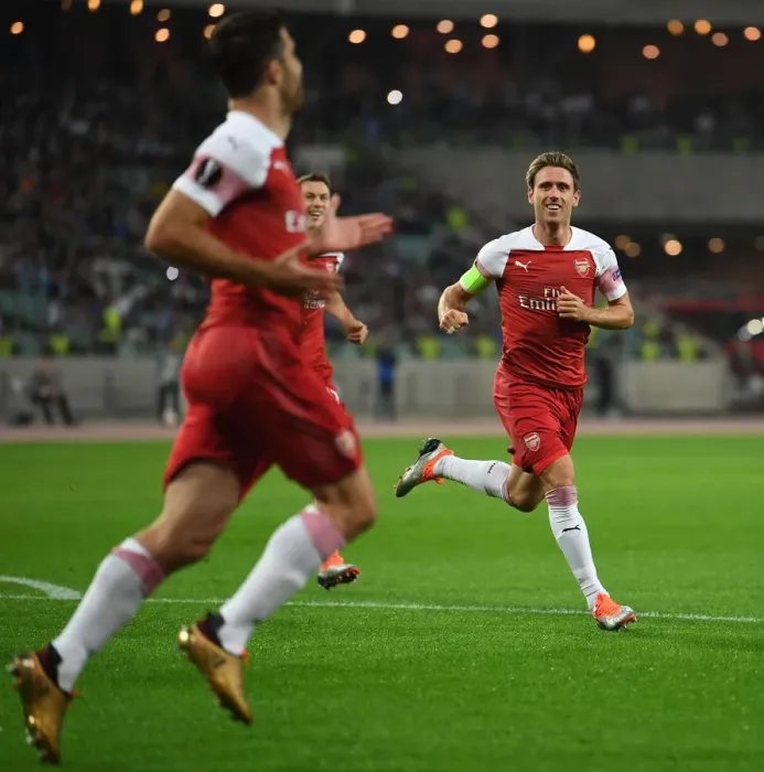 Framed Print : Nacho Monreal Celebrates Arsenal's First Goal Against Qarabag FK in Europa League Match