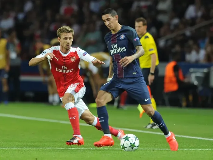 Framed Print : Nacho Monreal Shuts Down Angel Di Maria: Paris Saint-Germain vs. Arsenal, UEFA Champions League 2016-17